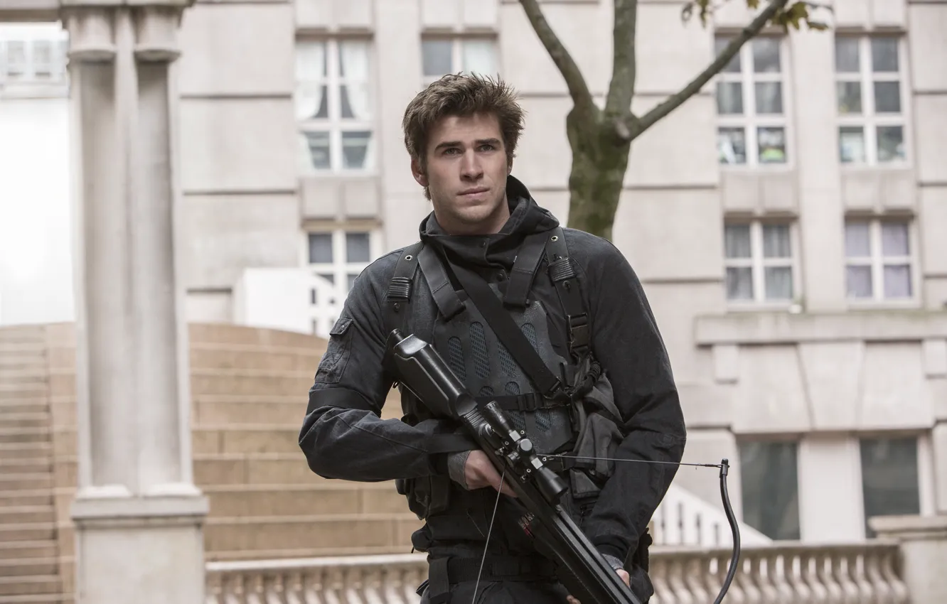 Photo wallpaper weapons, fiction, frame, costume, equipment, crossbow, Liam Hemsworth, Liam Hemsworth