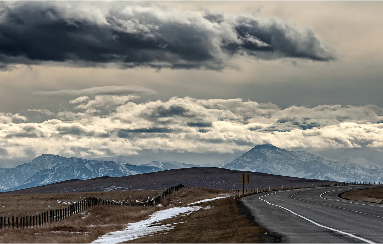 Photo wallpaper road, field, clouds, mountains, the fence