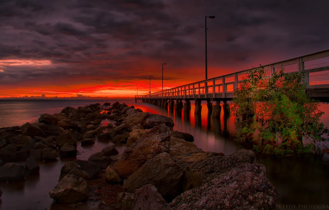 Photo wallpaper sea, the sky, clouds, sunset, stones, the ocean, pier, horizon