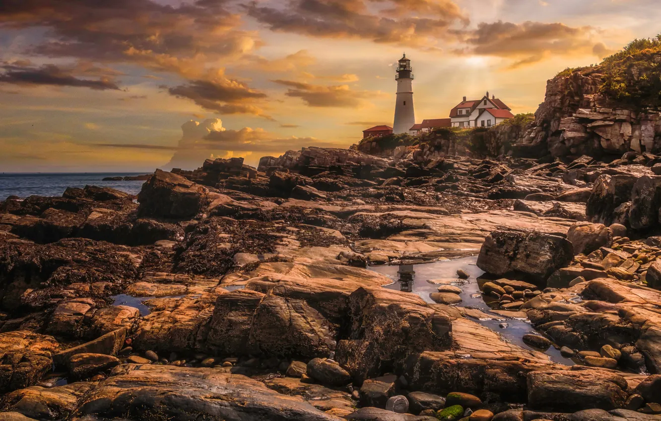 Photo wallpaper sea, clouds, light, sunset, stones, rocks, shore, lighthouse