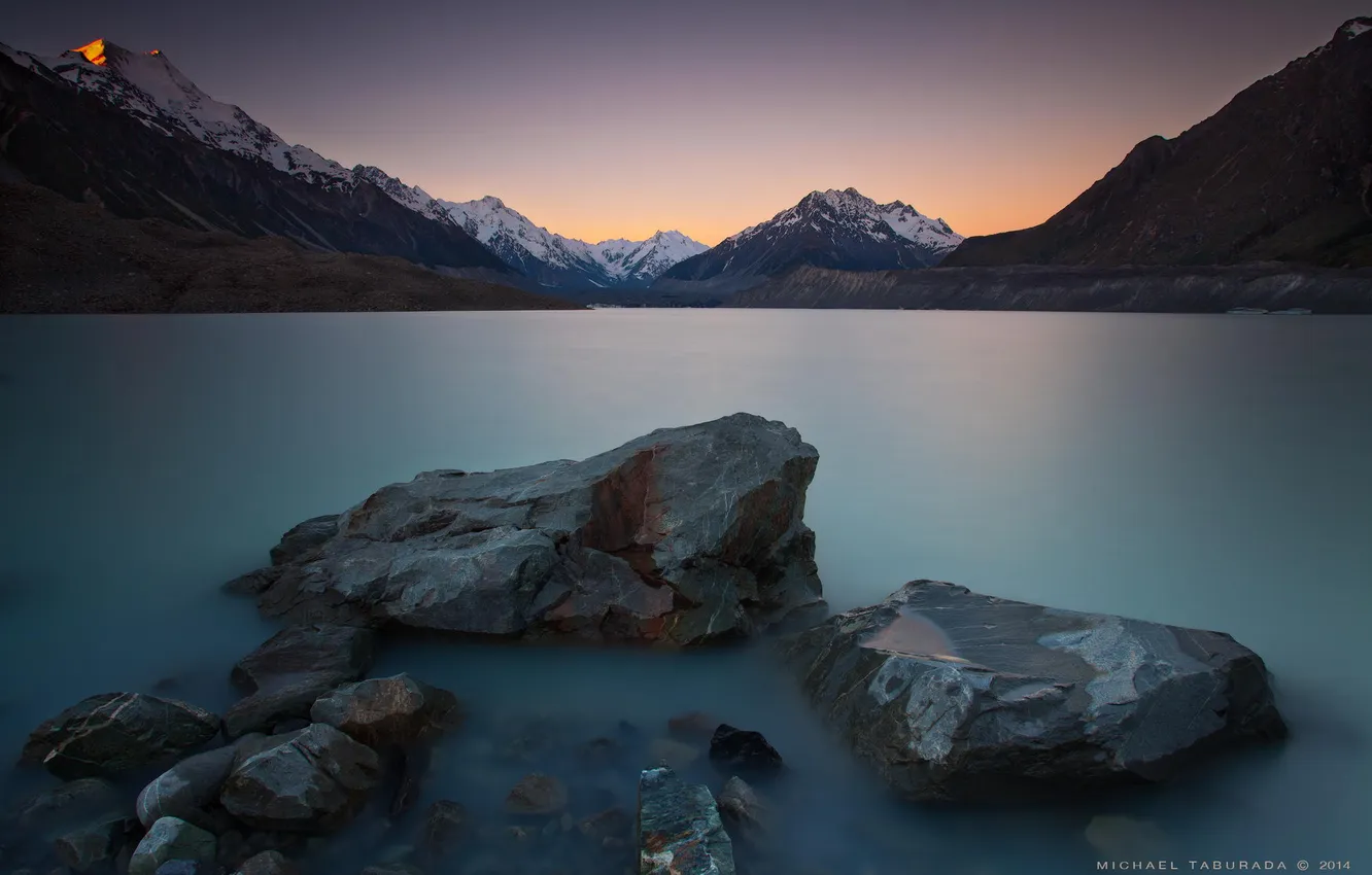 Photo wallpaper mountains, lake, stones, dawn, shore