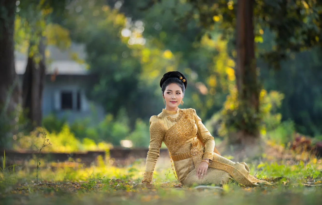 Photo wallpaper grass, look, girl, decoration, trees, face, pose, smile