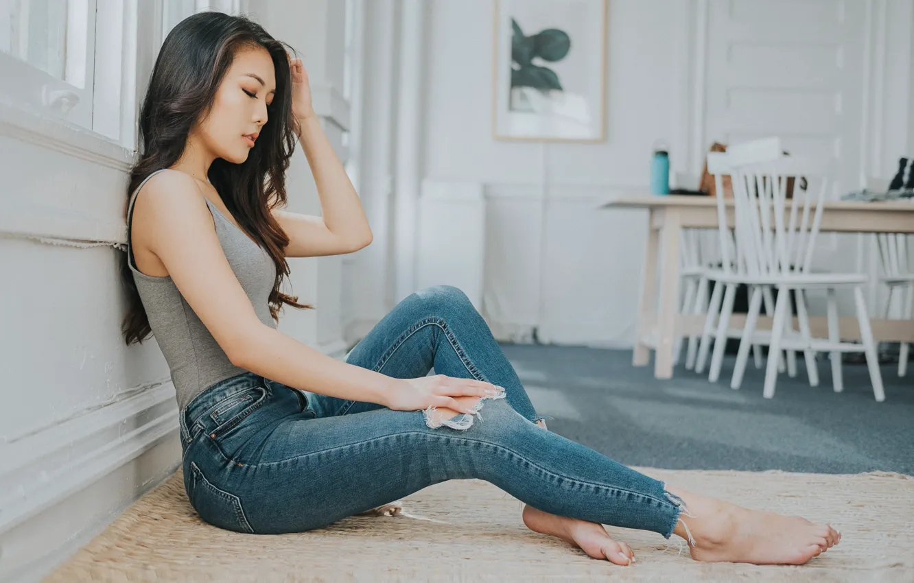 Photo wallpaper girl, jeans, legs, sitting