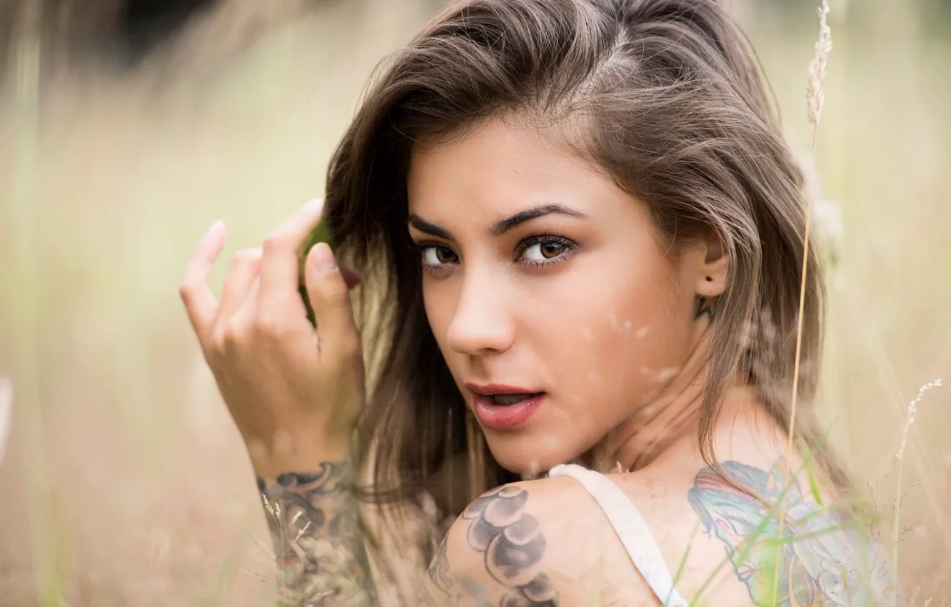 Photo wallpaper summer, grass, look, girl, model, brunette, tattoo, meadow