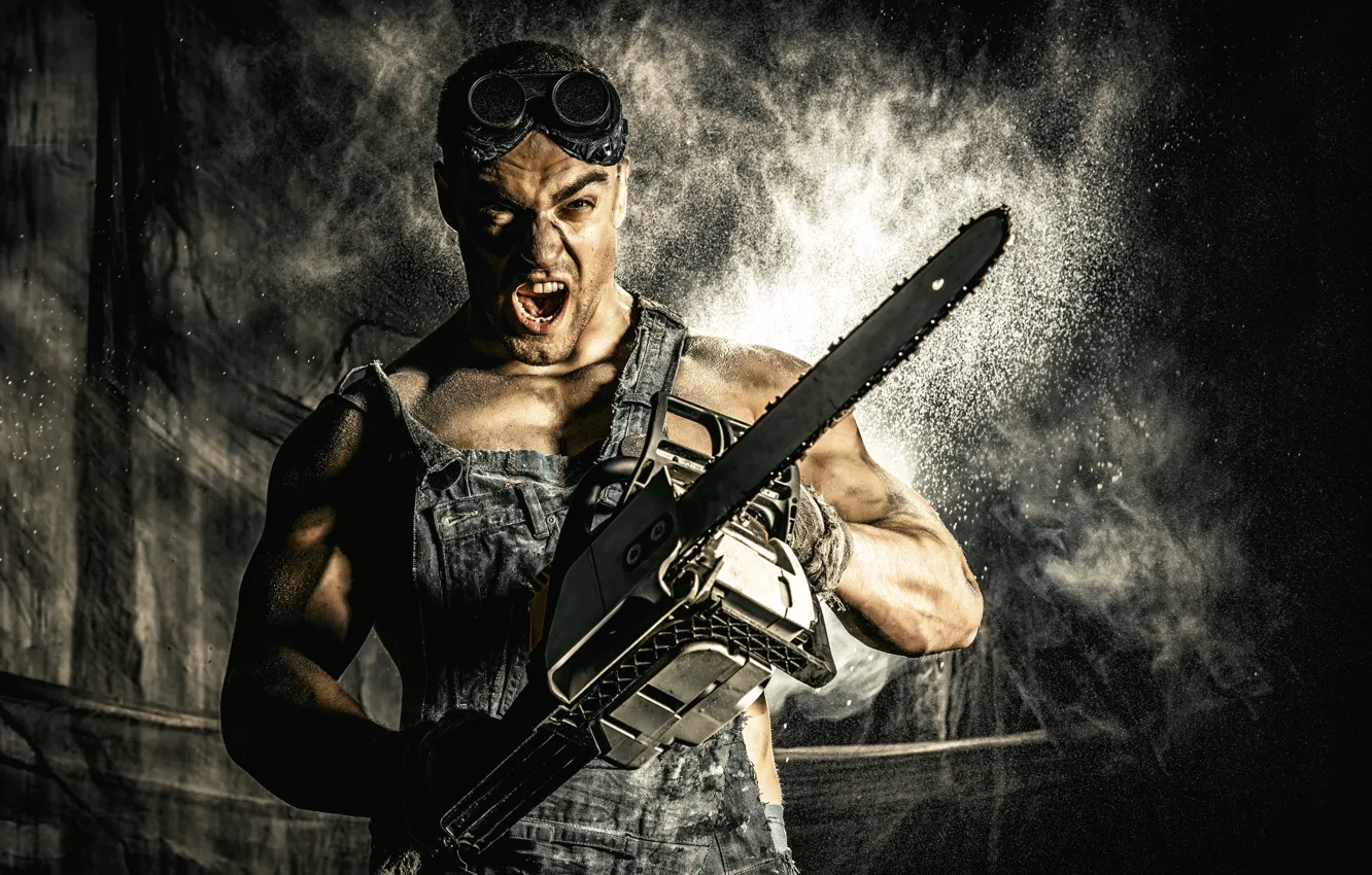 Photo wallpaper glasses, guy, jumpsuit, chainsaw, hard worker