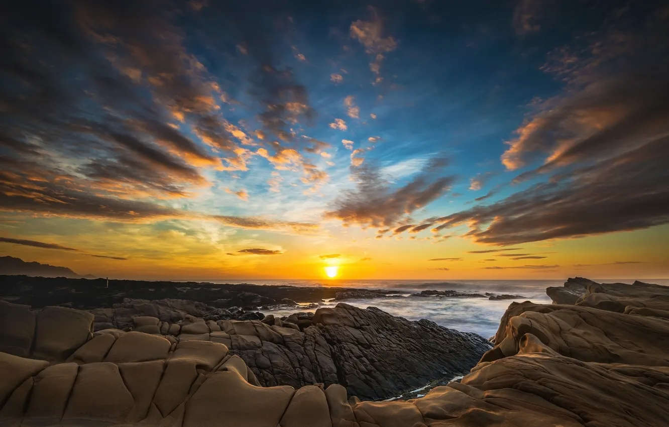 Photo wallpaper sea, the sky, the sun, clouds, sunset, blue, stones, rocks