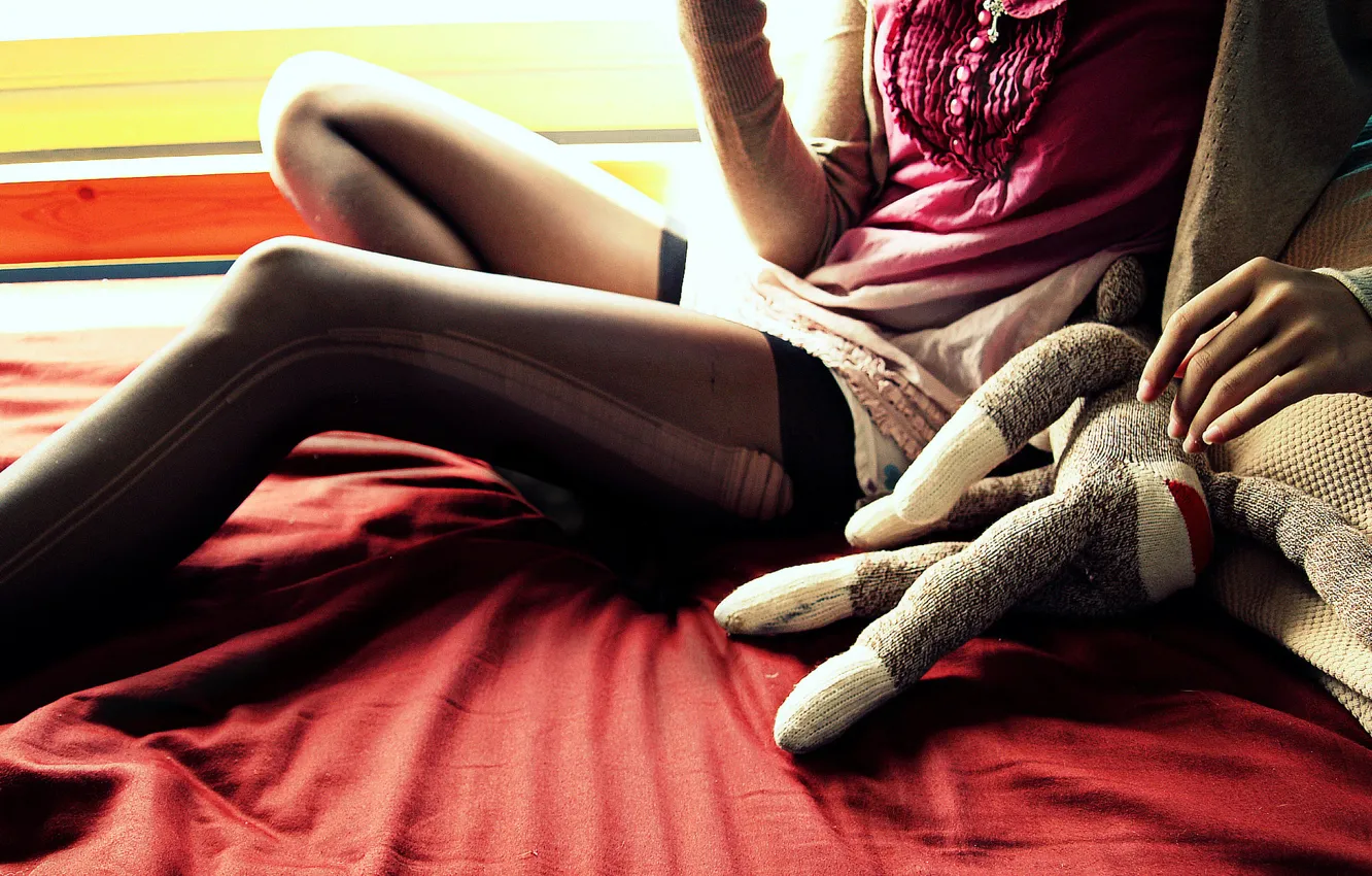 Photo wallpaper girl, toy, bed, stockings, plush, torn