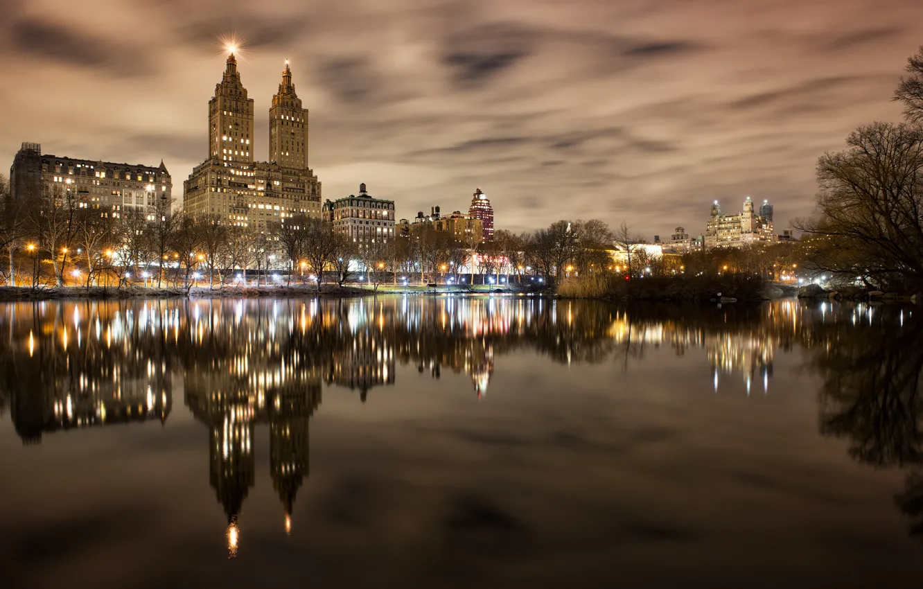 Photo wallpaper clouds, night, the city, lights, reflection, shore, building, home