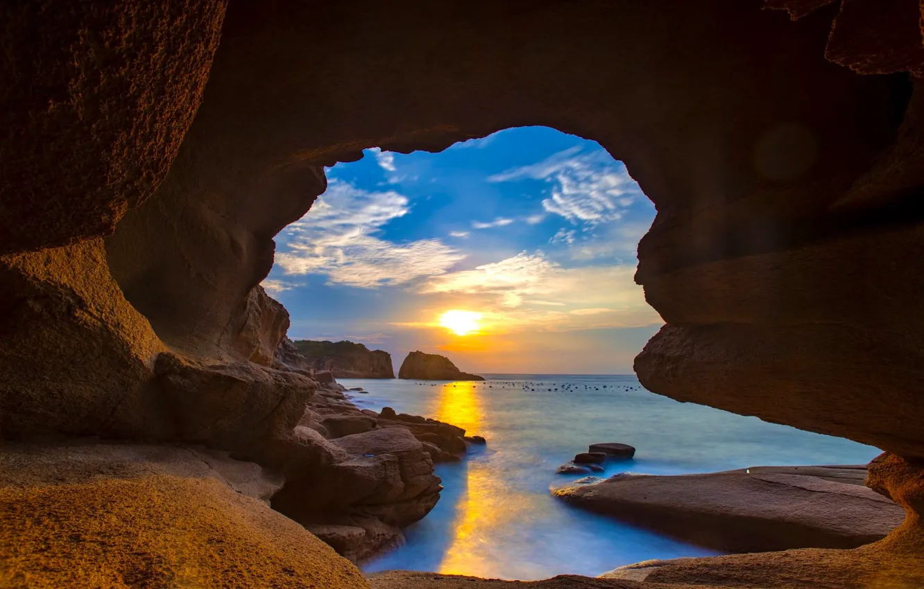 Photo wallpaper sea, the sun, clouds, light, sunset, blue, stones, rocks