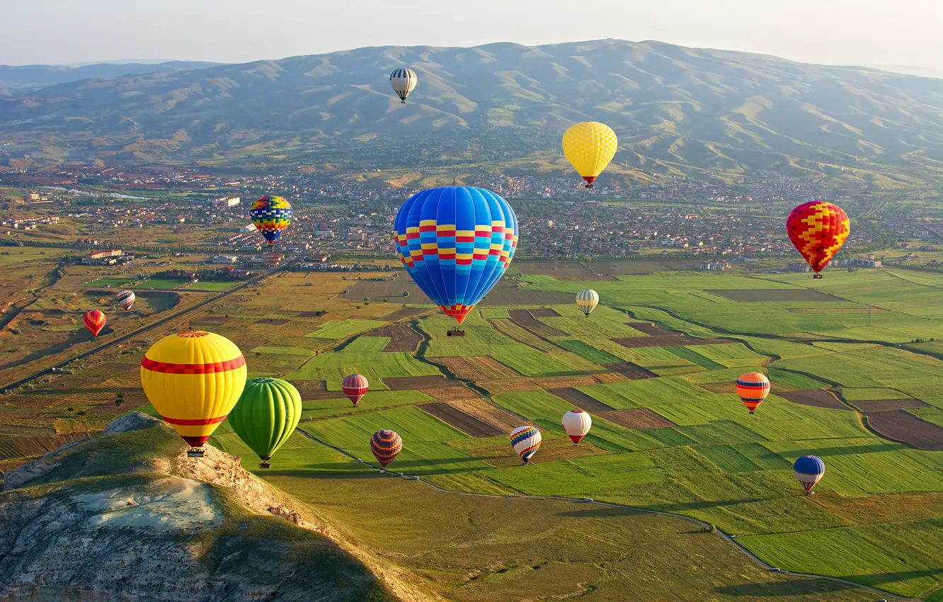 Photo wallpaper the sun, mountains, balloons, field, home, valley, panorama, Turkey