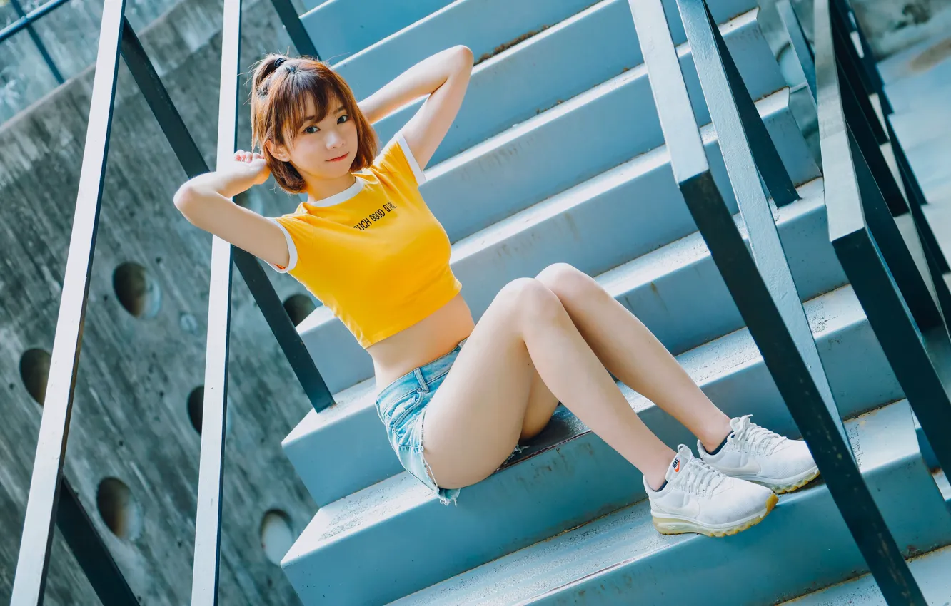 Photo wallpaper Asian, gesture, beautiful girl, denim shorts, white sneakers, sitting on the steps, yellow top