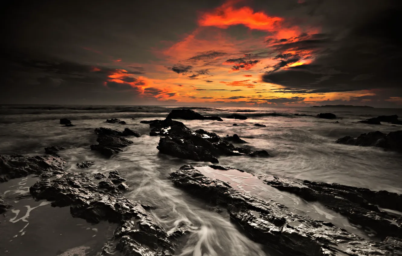 Photo wallpaper sea, clouds, sunset, stones, horizon, orange sky