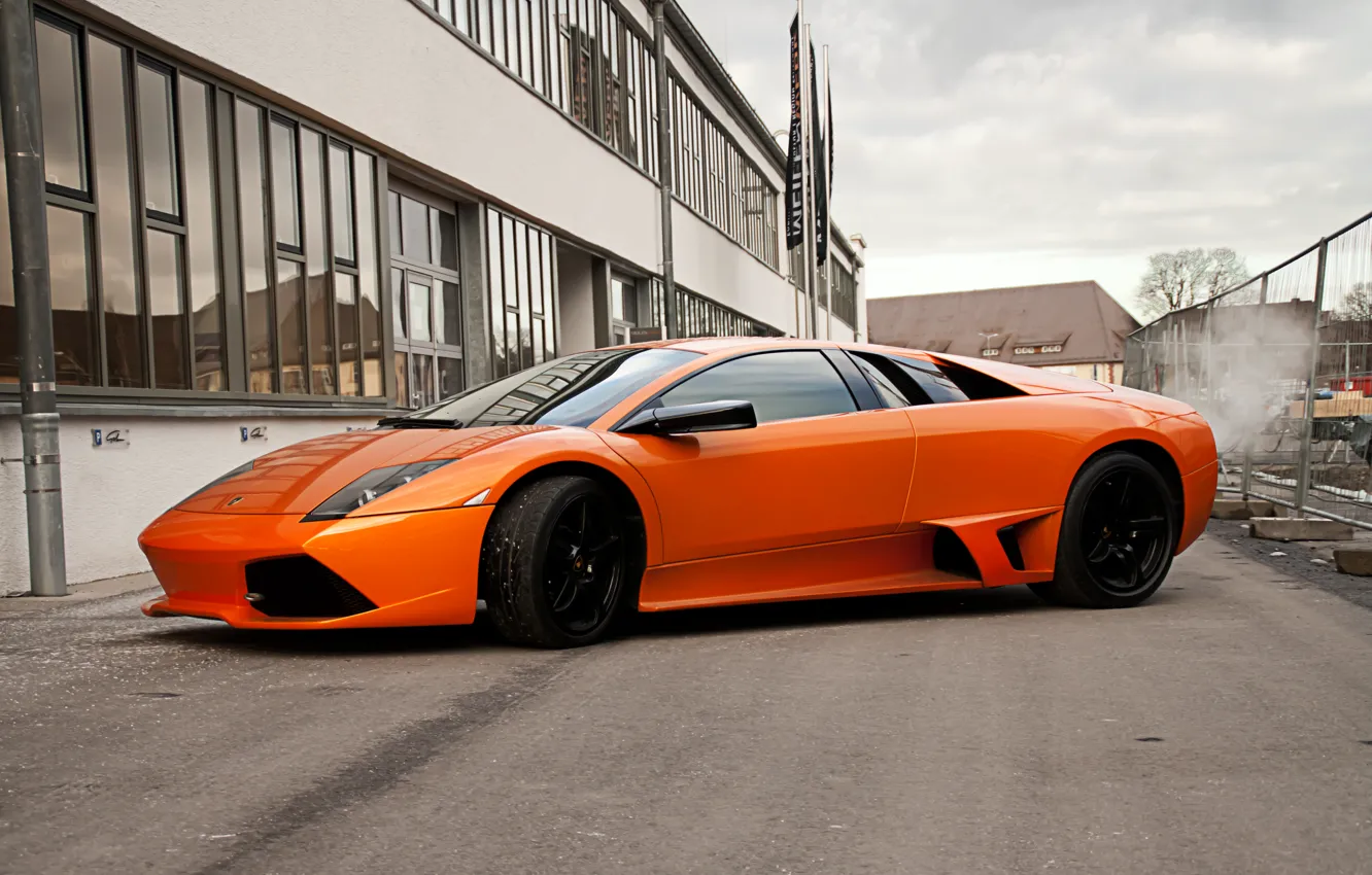 Photo wallpaper the sky, orange, clouds, the building, Windows, the fence, lamborghini, side view