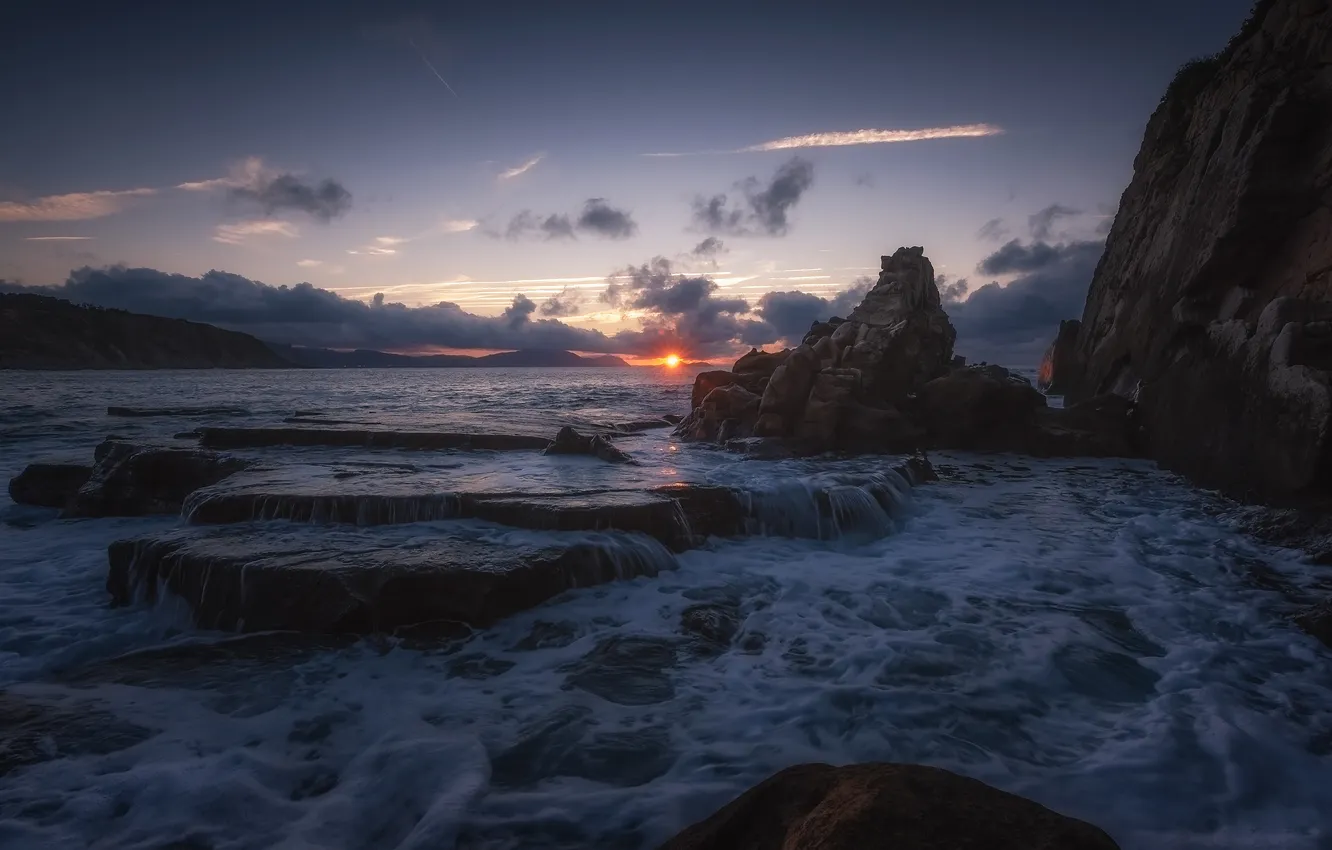 Photo wallpaper sea, wave, foam, the sun, clouds, sunset, stones, rocks