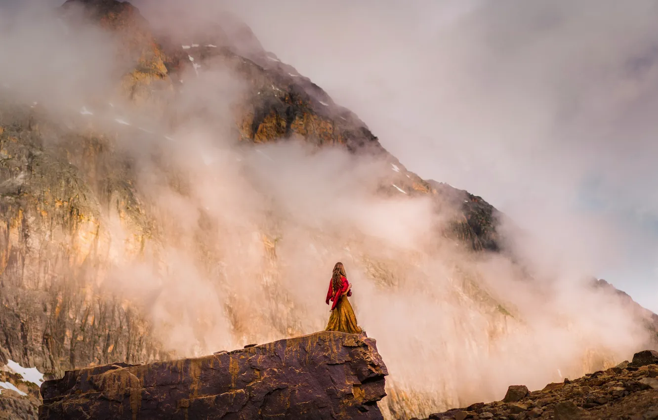 Photo wallpaper girl, clouds, mountains, fog, open, mood, rocks, danger