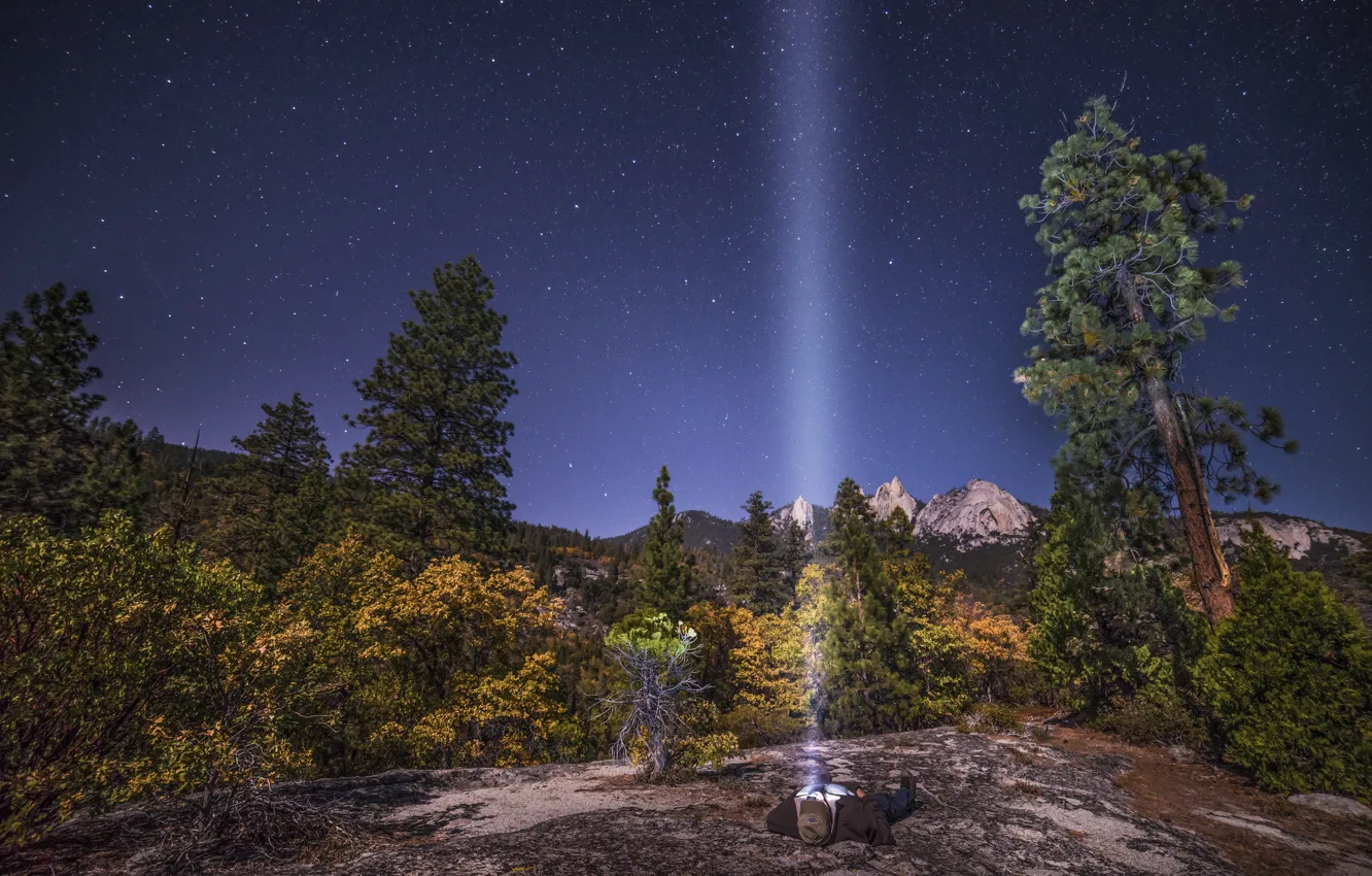 Photo wallpaper the sky, stars, nature, rocks, people, lies, national Park, Shine a flashlight