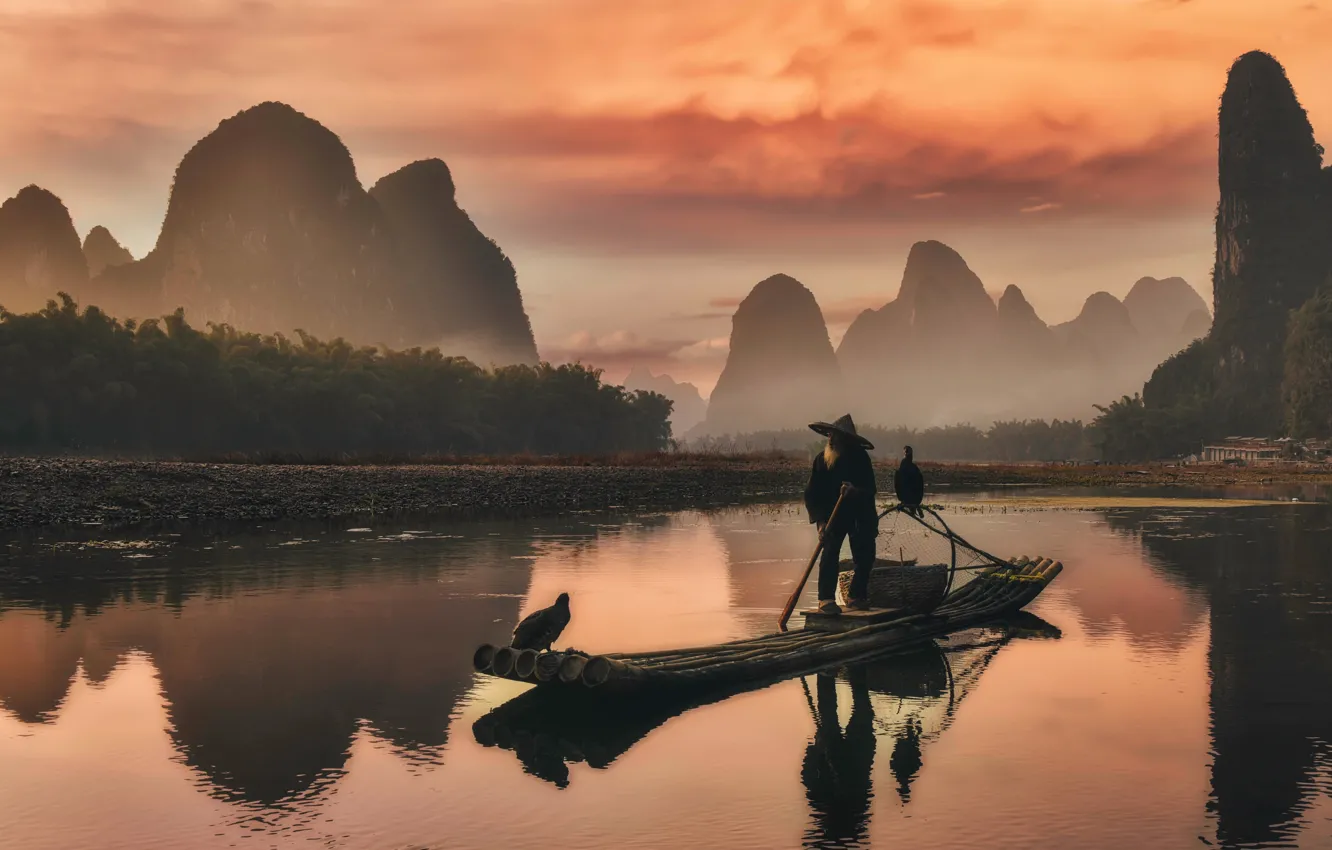 Photo wallpaper sunset, mountains, fog, reflection, rocks, dawn, bird, shore