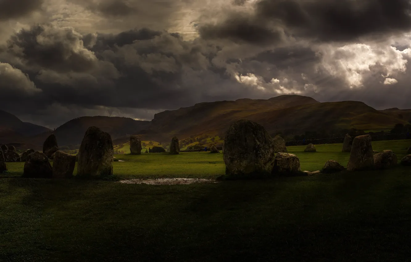 Photo wallpaper field, rays, landscape, mountains, clouds, stones, overcast, England