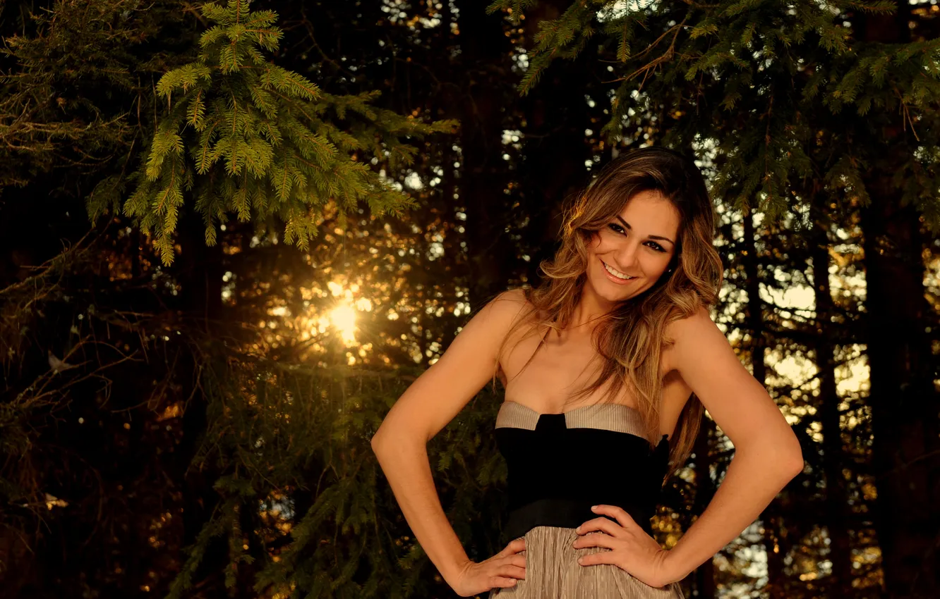 Photo wallpaper forest, girl, the sun, rays, trees, smile, dress