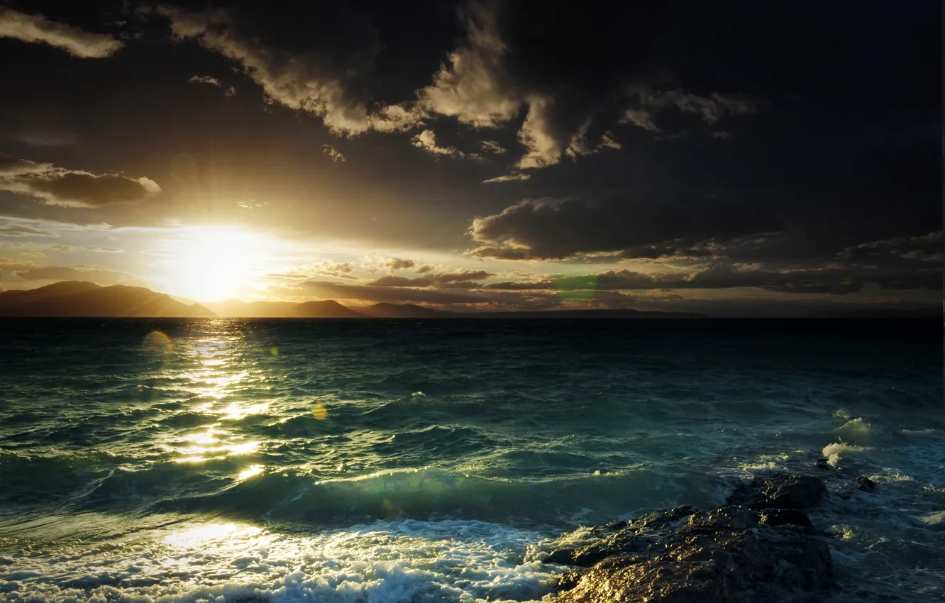 Photo wallpaper sea, wave, the sun, mountains, clouds, glare, stone, Bay