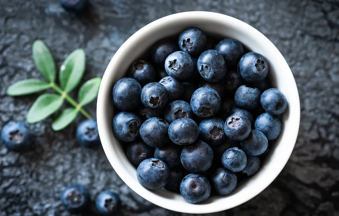 Photo wallpaper leaves, berries, the dark background, blueberries, Cup, bowl, a lot
