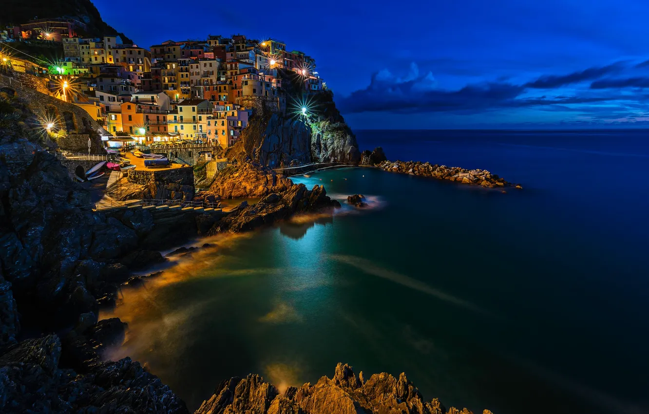 Photo wallpaper road, sea, clouds, night, the city, stones, rocks, Italy