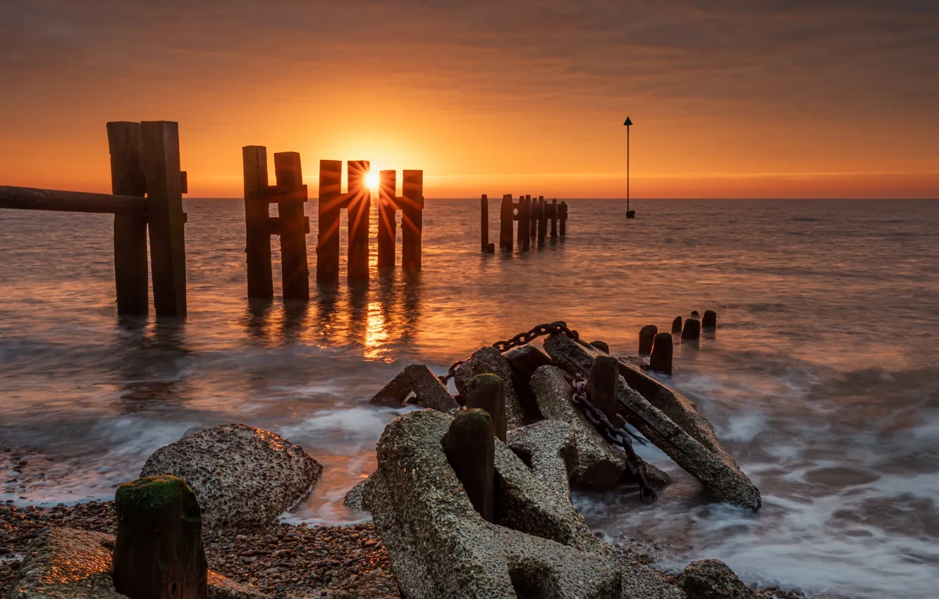 Photo wallpaper sea, sunset, piles