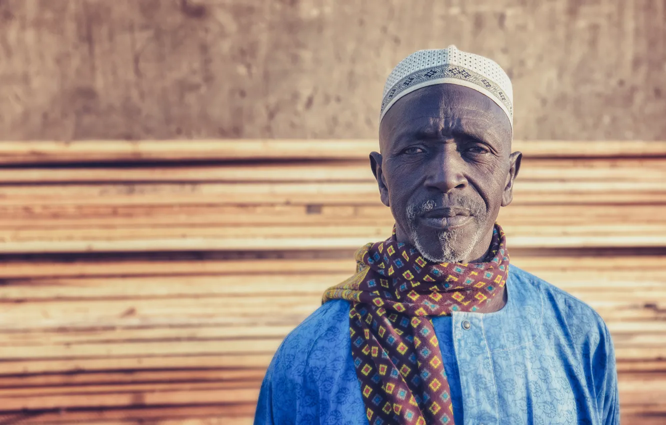Photo wallpaper eyes, trees, hat, scarf, male, blue shirt