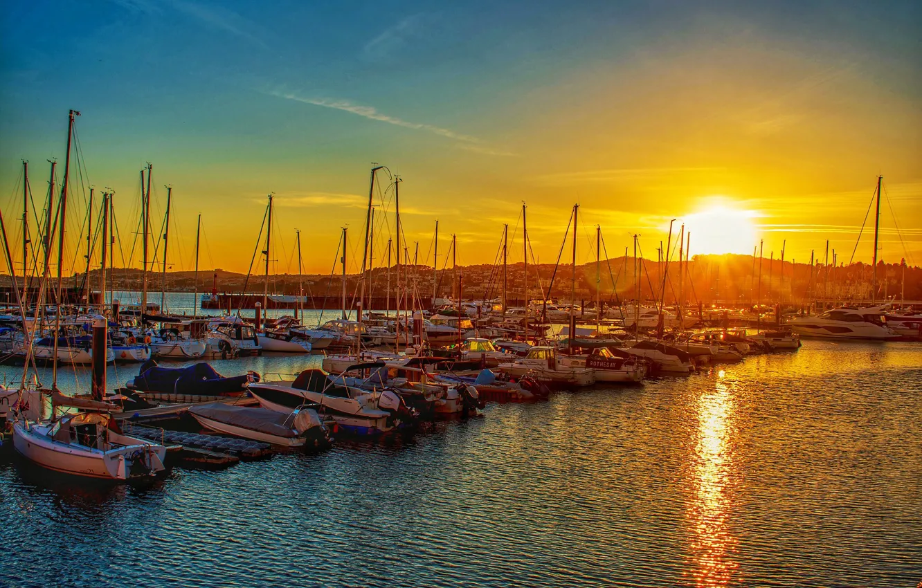 Photo wallpaper the sky, water, the sun, rays, light, sunset, the city, lights