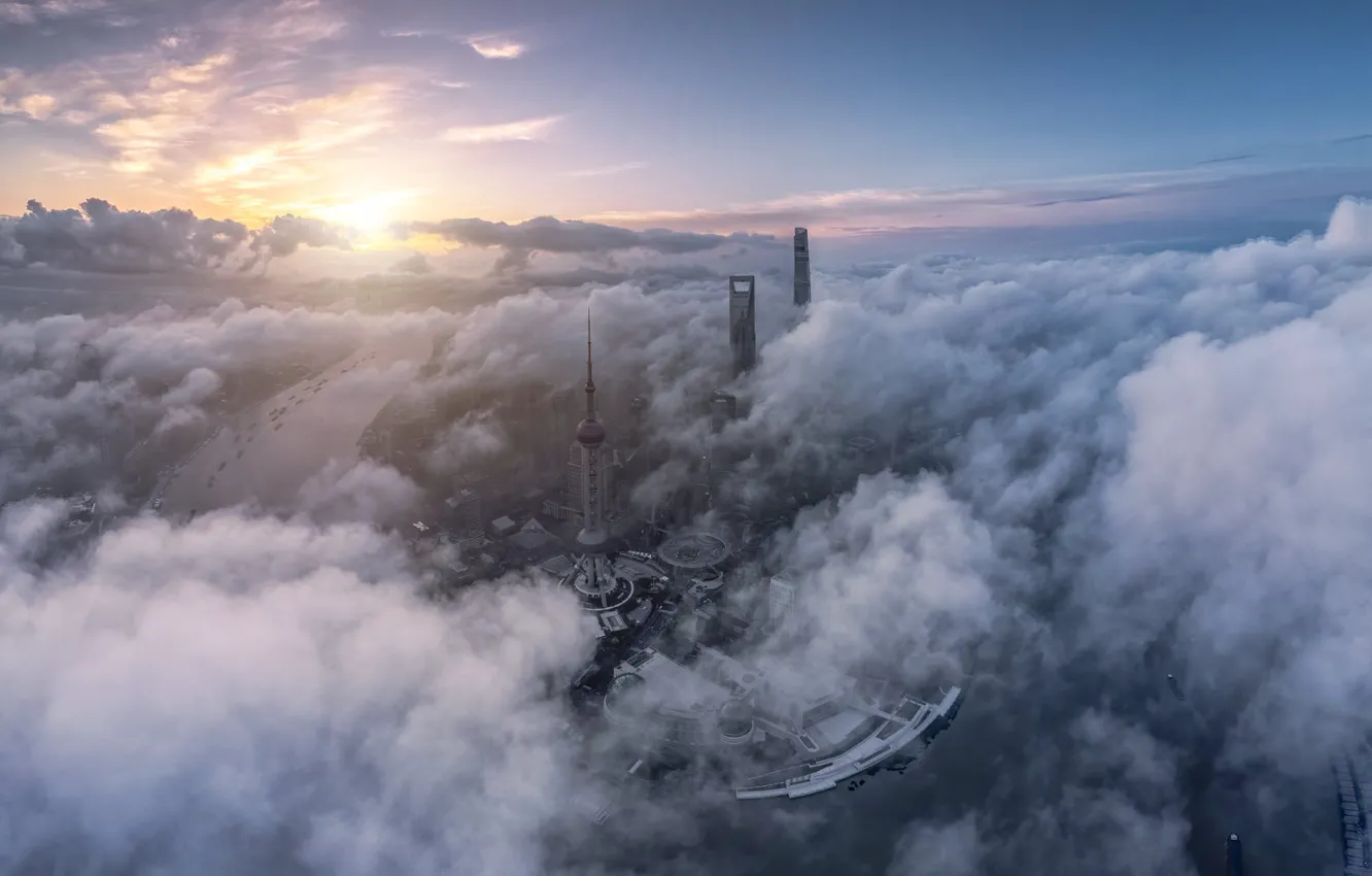 Photo wallpaper the sky, the sun, clouds, the city, fog, dawn, view, building