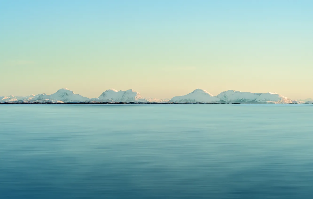 Photo wallpaper sea, the sky, snow, sunset, hills, shore, horizon