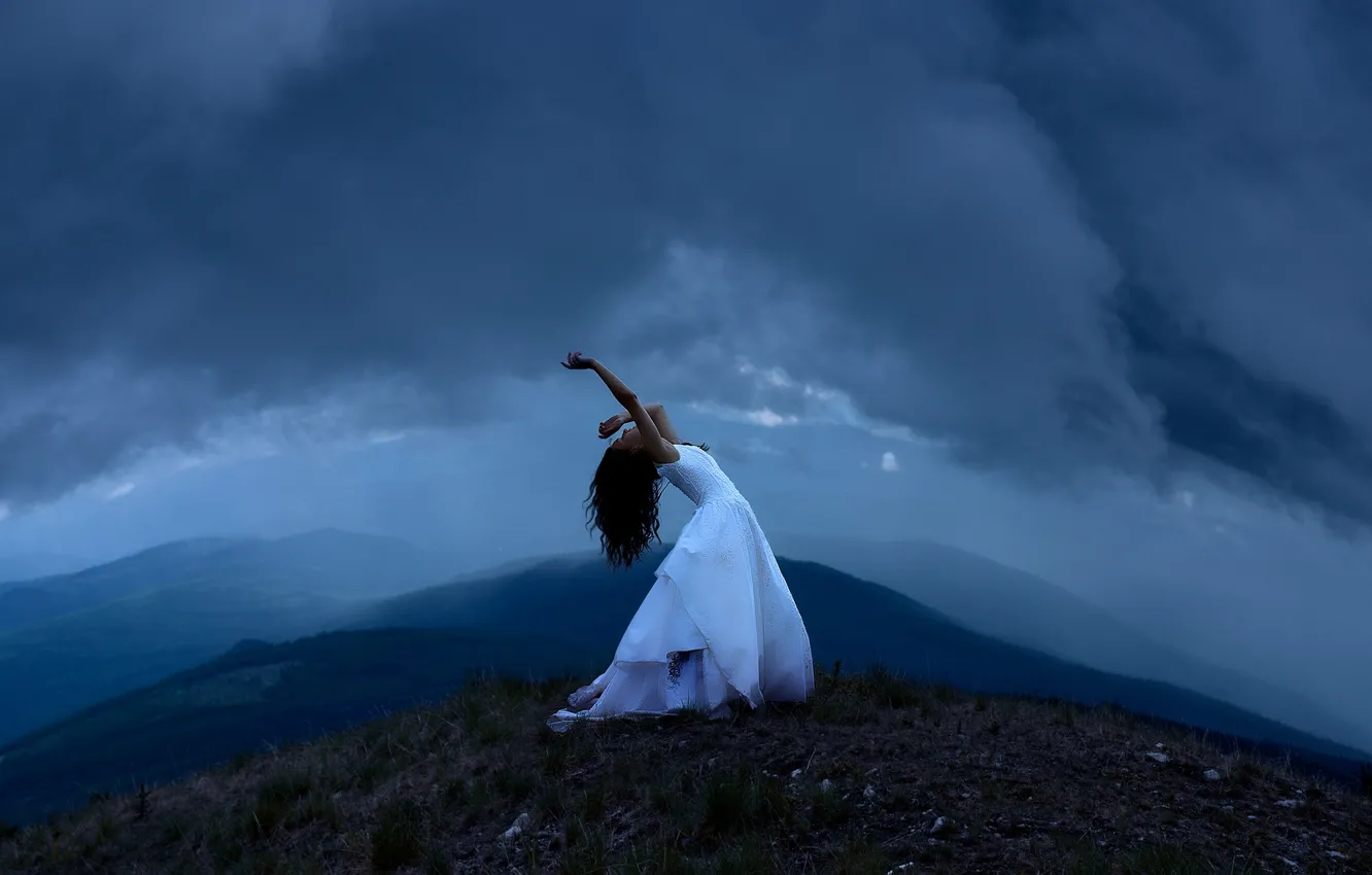 Photo wallpaper the sky, girl, clouds, mountains, pose, fog, loneliness, hair