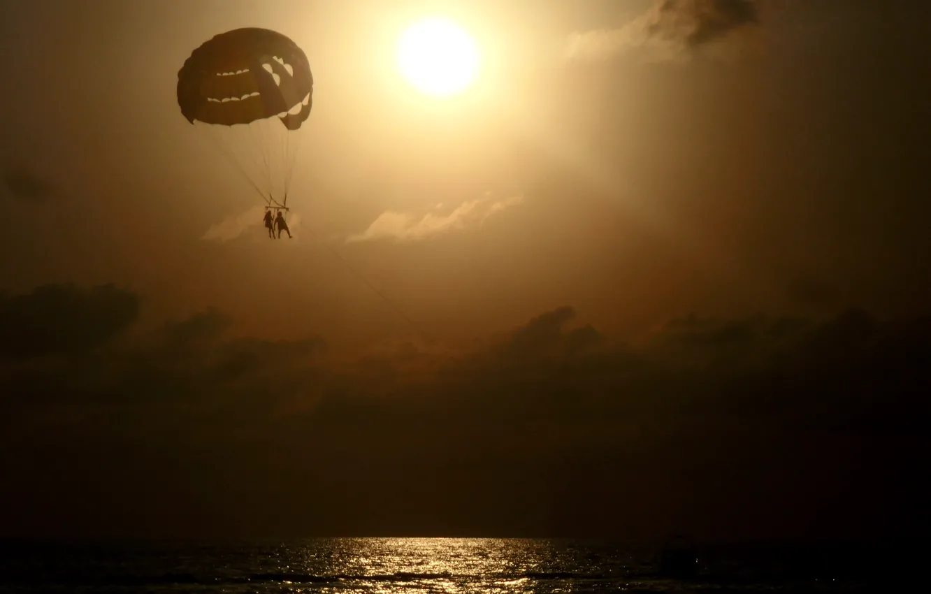 Photo wallpaper sea, the sun, clouds, sunset, stay, romance, parachute, pair
