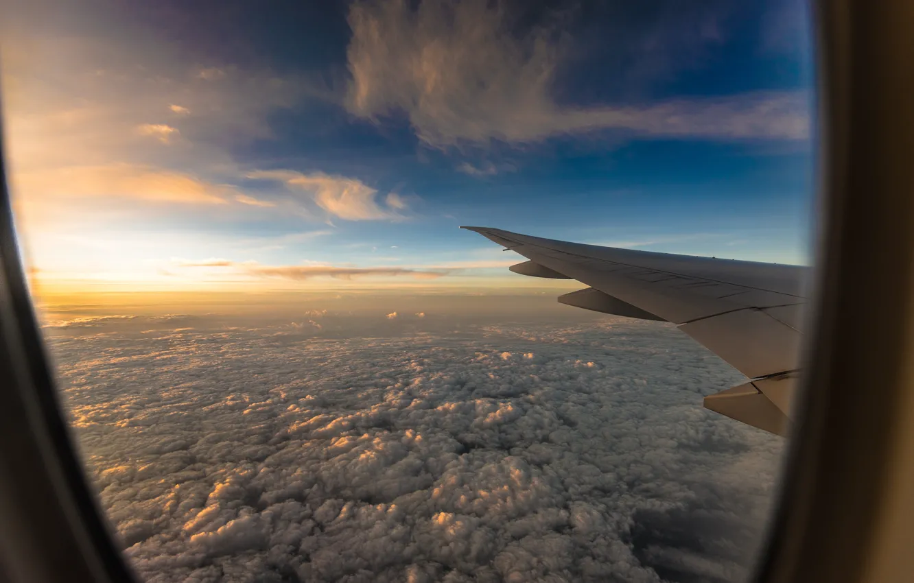 Photo wallpaper the sky, the sun, clouds, flight, the plane, view, height, wing