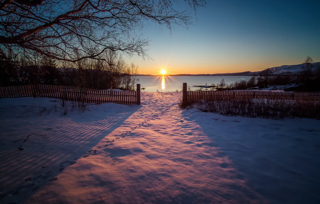 Photo wallpaper the sun, snow, sunset, traces