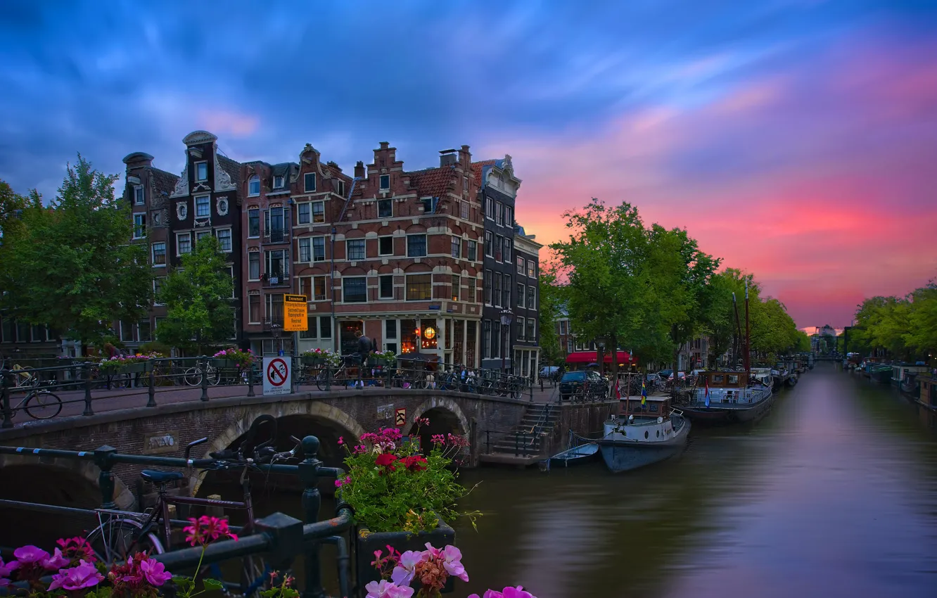 Photo wallpaper sunset, flowers, bridge, the city, building, home, boats, Amsterdam