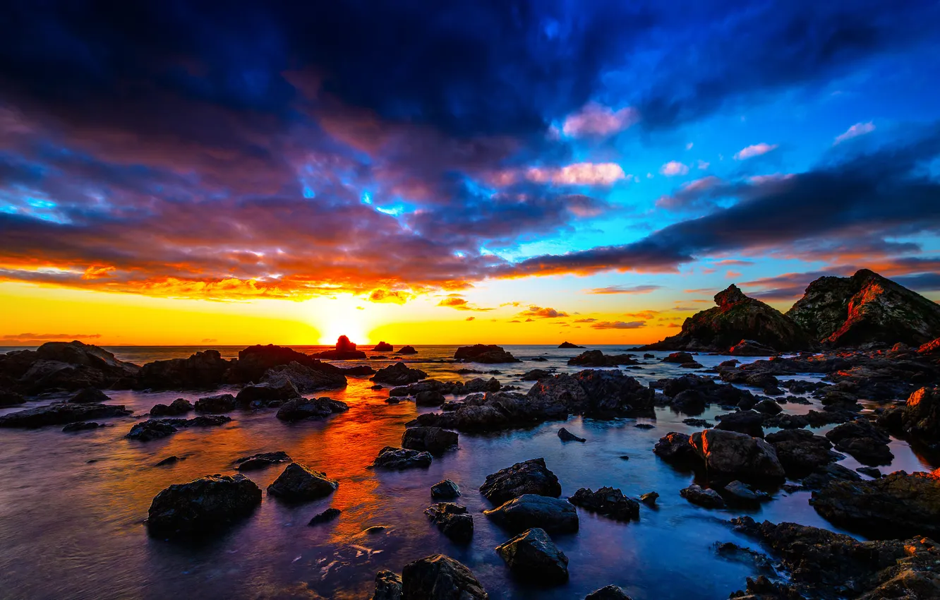 Photo wallpaper sea, the sky, clouds, sunset, stones, rocks, tide, glow