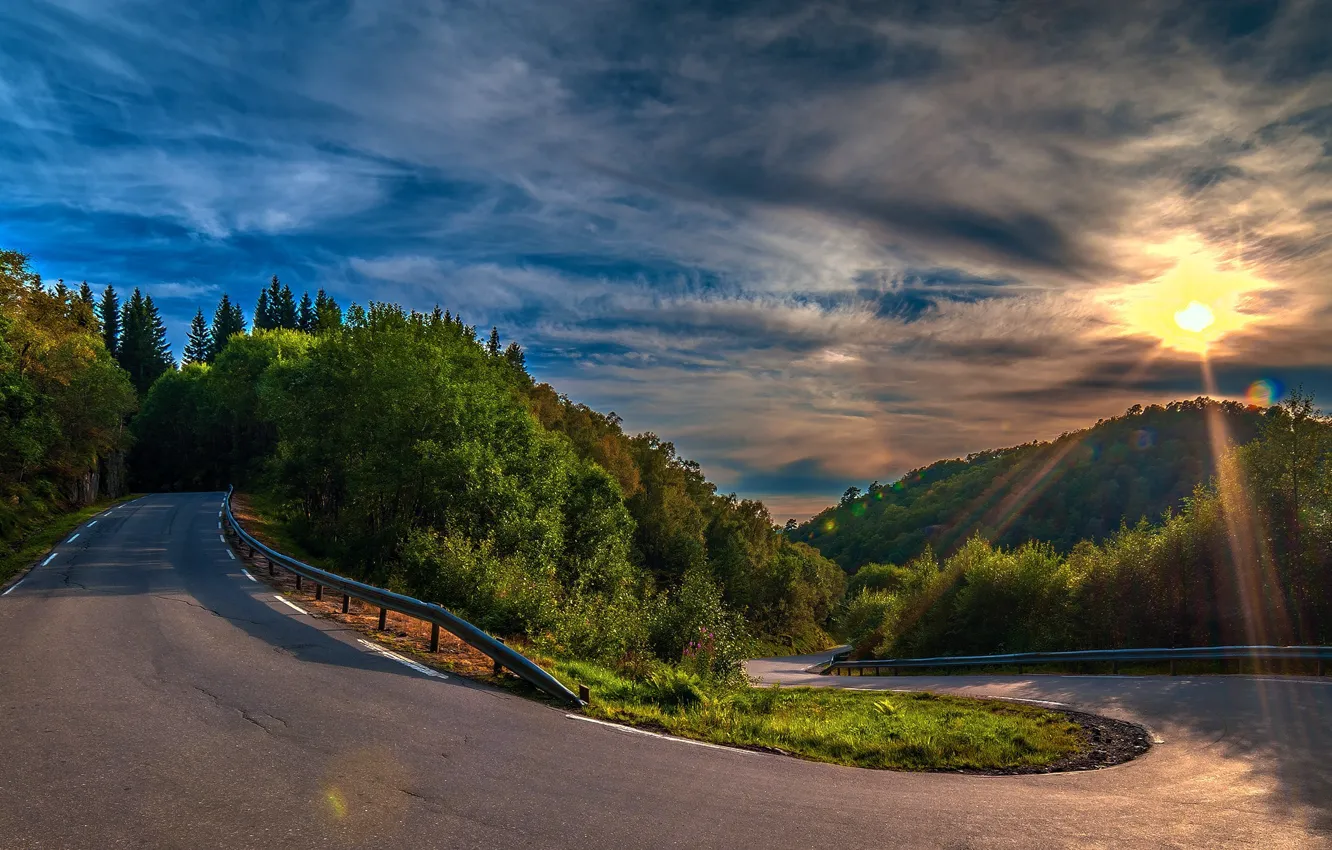 Photo wallpaper road, forest, asphalt, clouds, trees, sunset, hills, turn