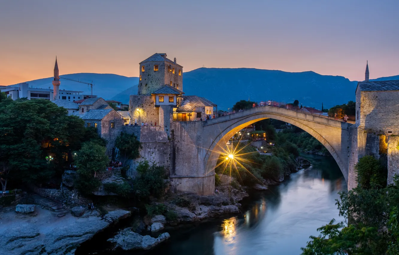 Photo wallpaper mountains, bridge, river, building, home, the evening, Bosnia and Herzegovina, Mostar