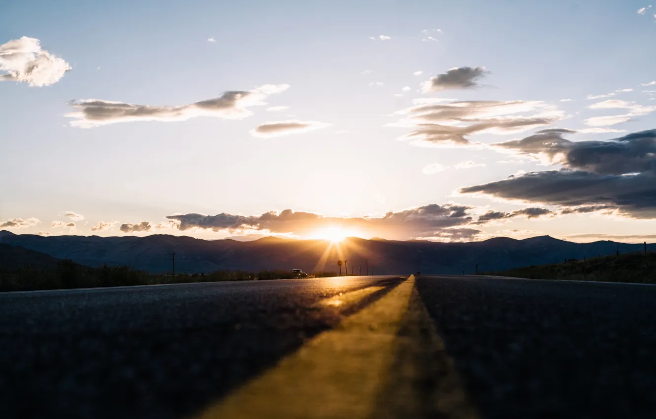 Photo wallpaper road, the sky, the sun, clouds, sunset, hills, horizon, silhouette