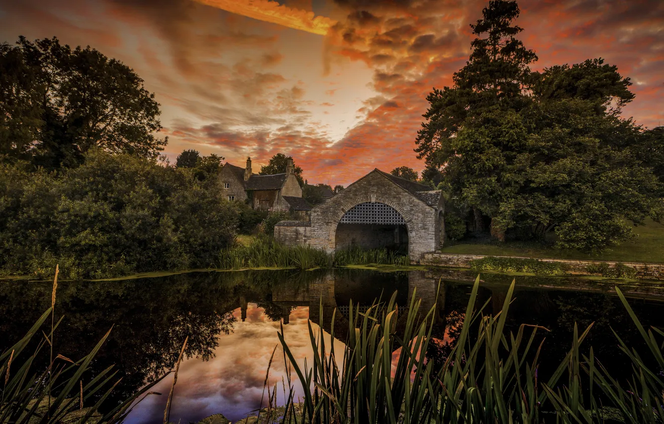 Photo wallpaper the sky, trees, lake, reflection, home, mirror, the bushes, orange clouds