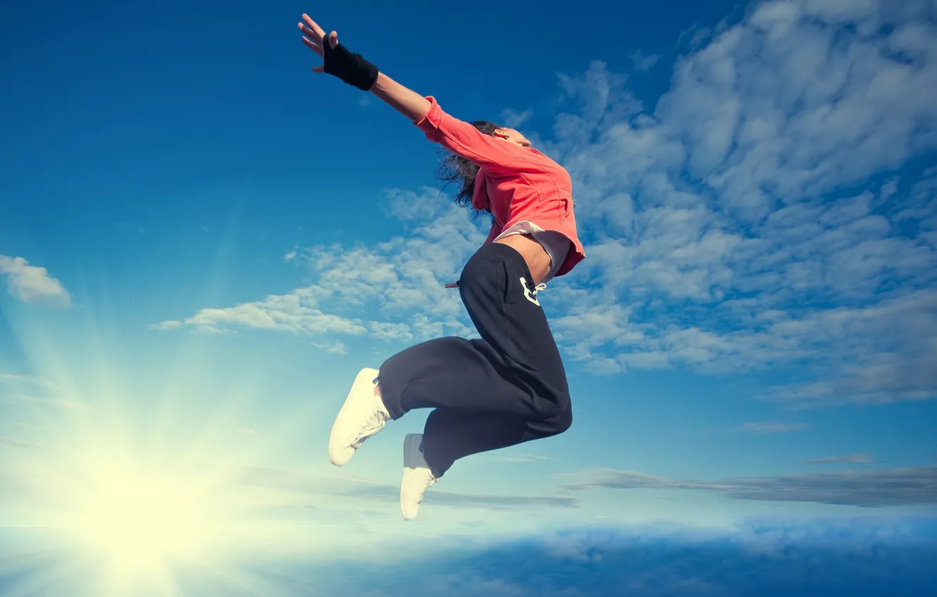 Photo wallpaper the sky, girl, the sun, clouds, rays, pose, background, jump