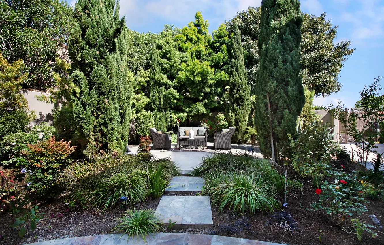 Photo wallpaper trees, flowers, chair, pillow, garden, track, the bushes, table