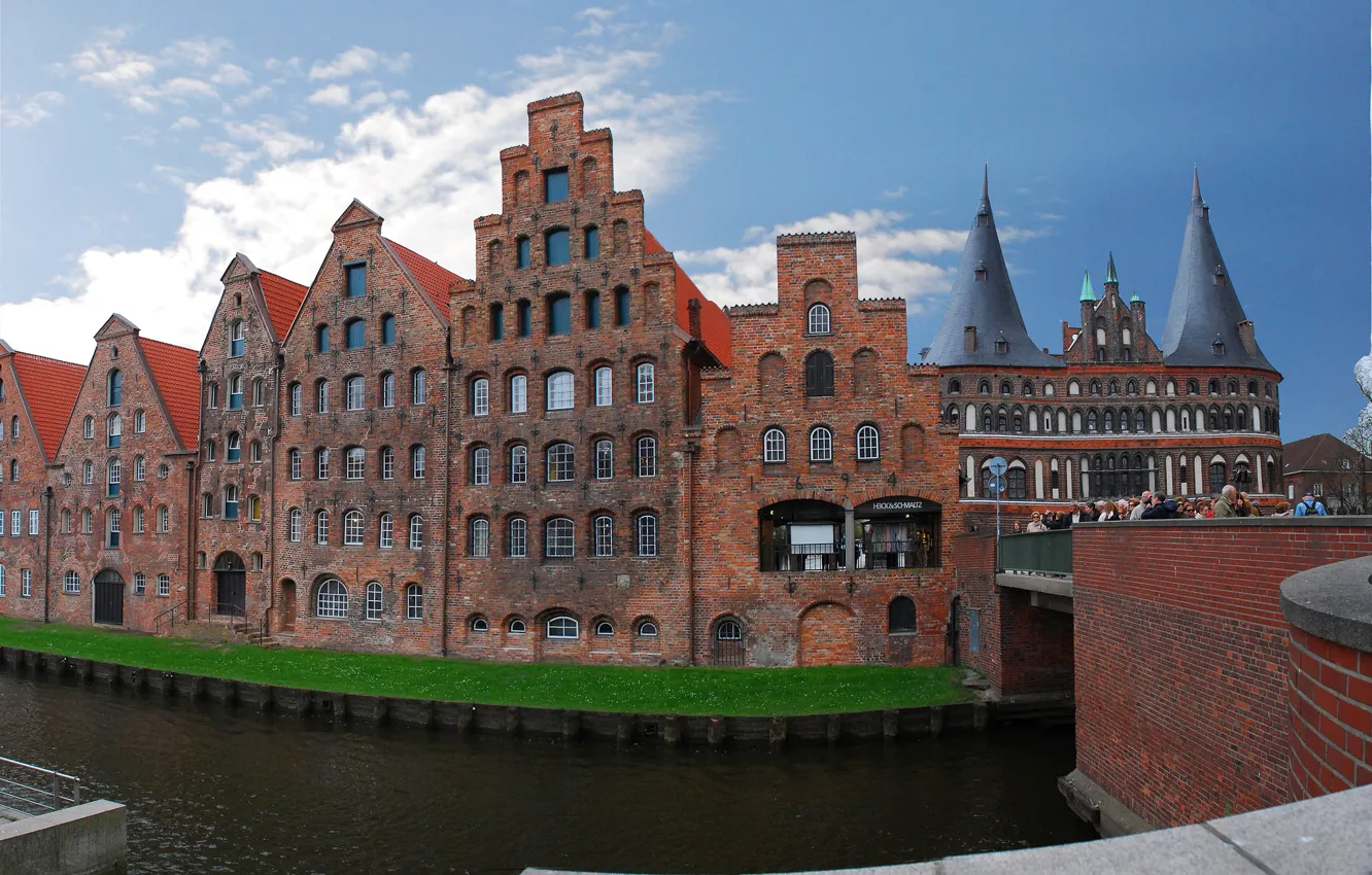 Photo wallpaper the sky, bridge, river, tower, home, gate, Germany, Lubeck