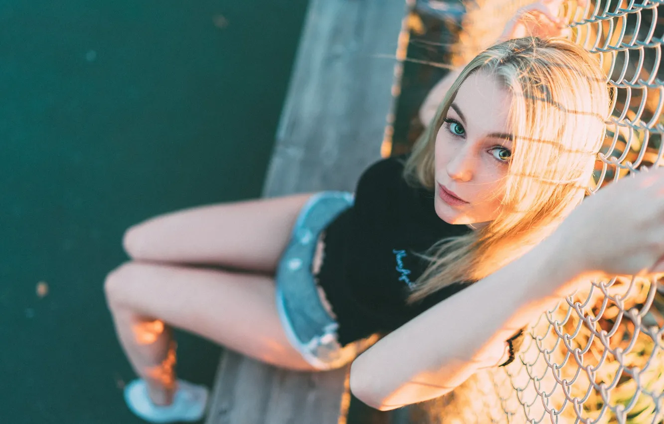 Photo wallpaper girl, shorts, green eyes, legs, photo, model, fence, bokeh