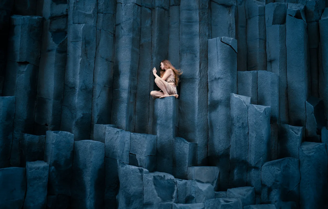 Photo wallpaper girl, nature, pose, stones, rocks, height, dress, sitting