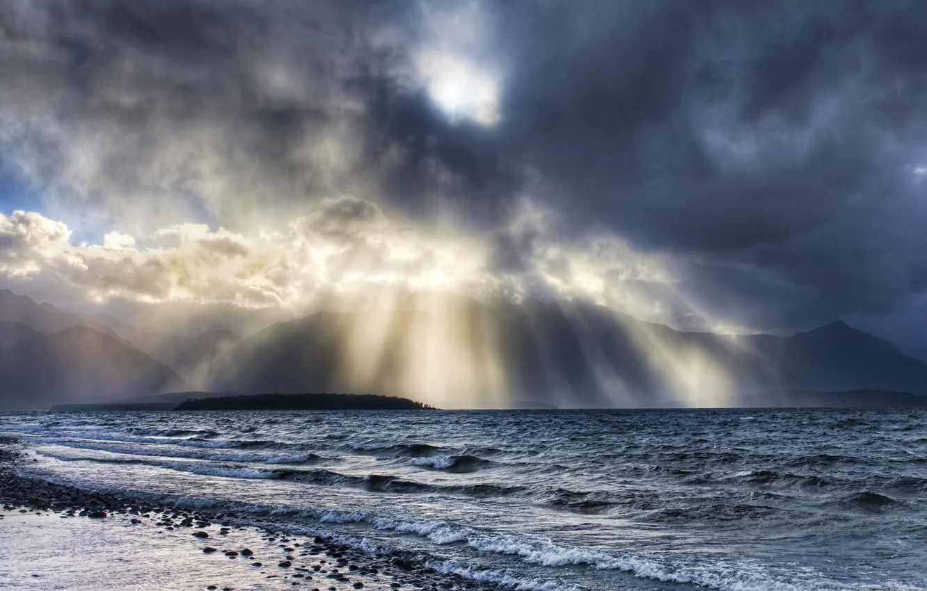 Photo wallpaper wave, water, clouds, rays, light, stones, Shore