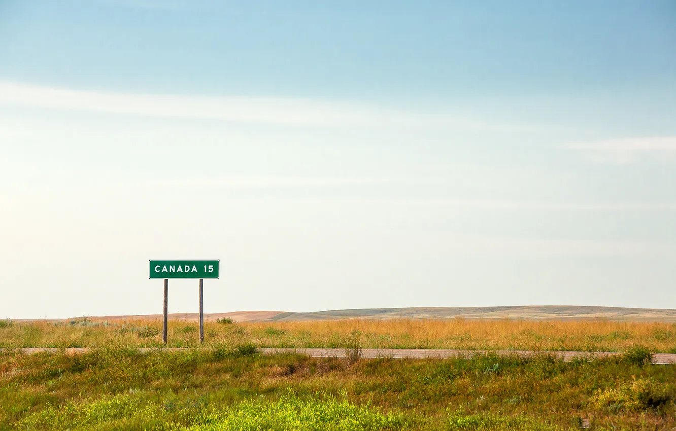 Photo wallpaper road, field, the sky, grass, clouds, sign, the bushes