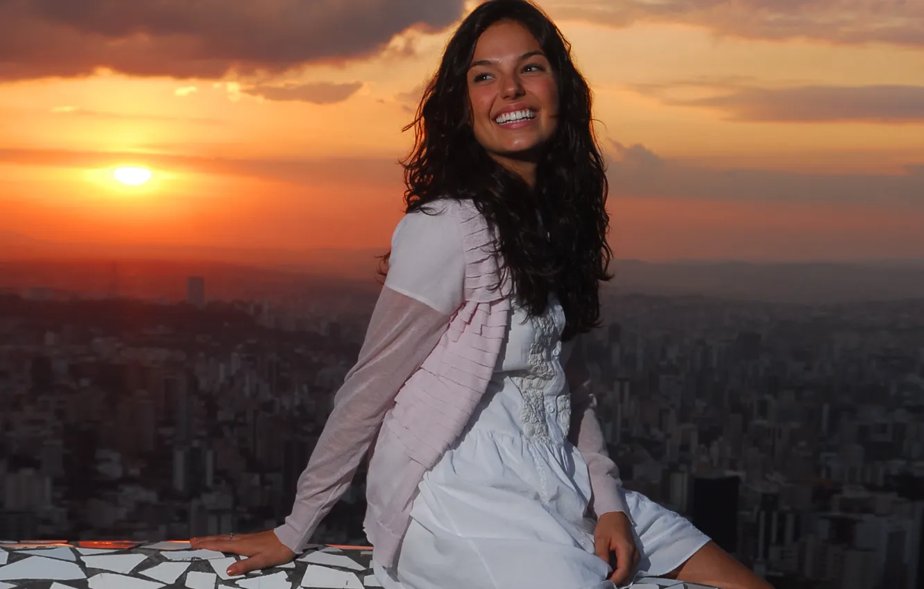 Photo wallpaper girl, sunset, night, the city, sitting, smiling, Isis Valverde