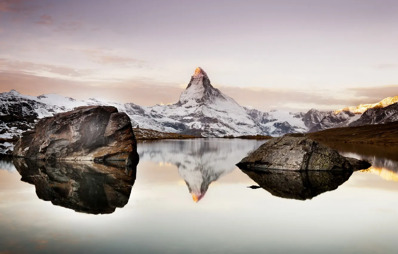 Photo wallpaper snow, mountains, lake, stones